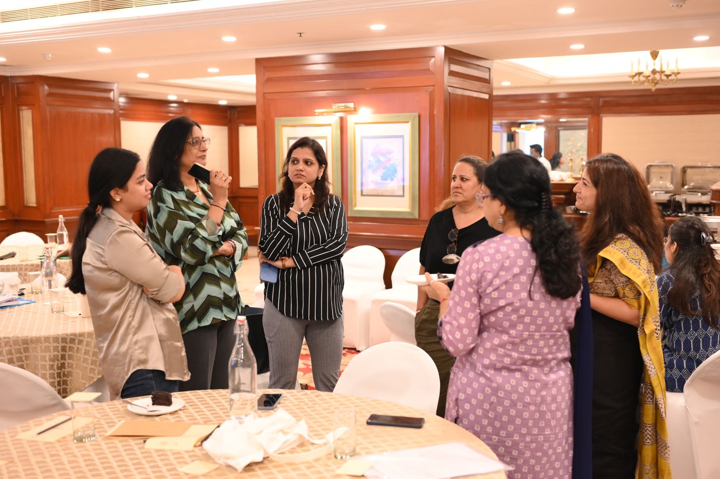 Participants talking together during a break